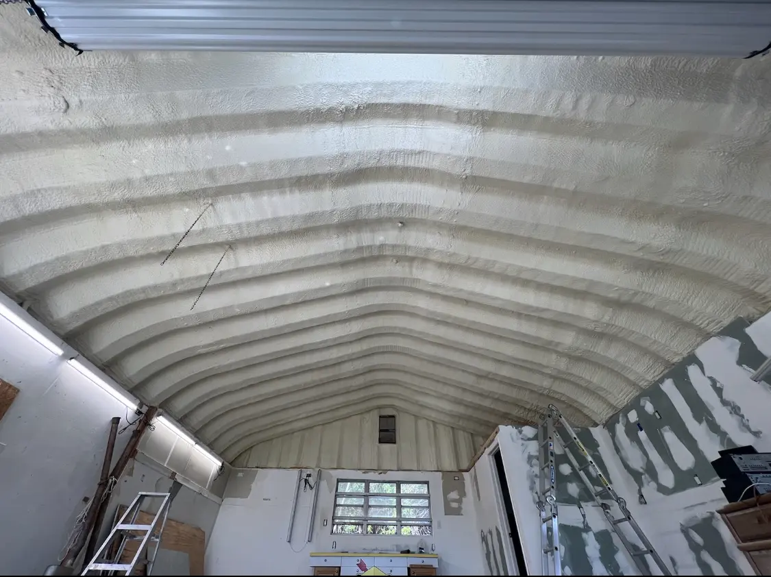 Spray polyurethane foam applied to the underside of a metal roof deck in Bridgewater Town